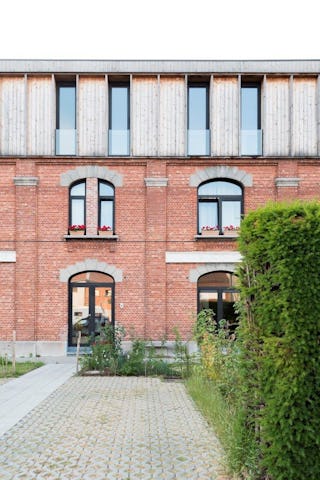 Beeld Jessy van der Werff Cohousing in voormalige rijkswachtkazerne Deurne - Polygoon Architectuur, Jouri De Pelecijn