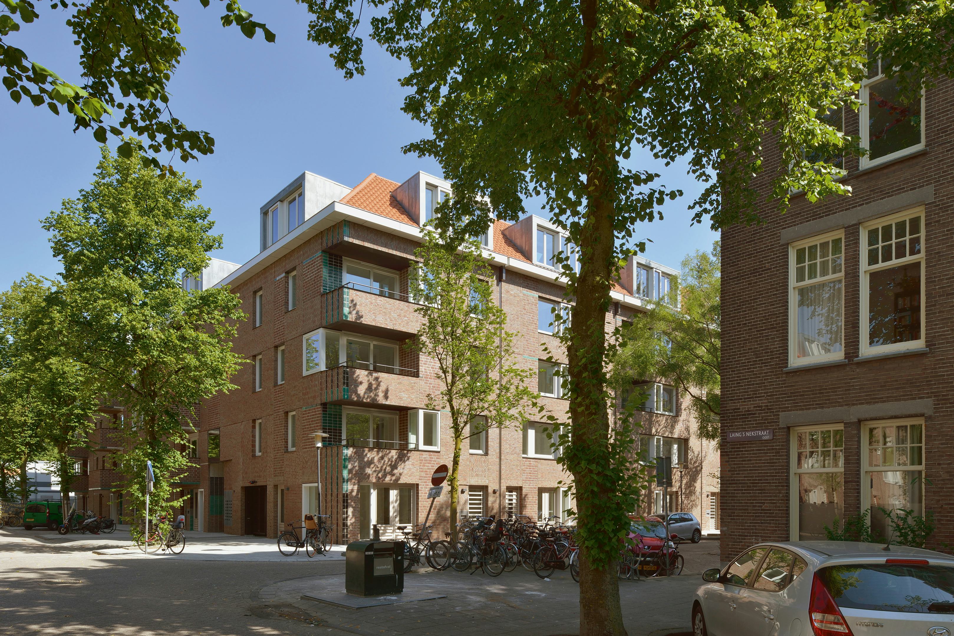 De Tugelawegblokken van M3H Architecten vervangen twee bouwblokken in een ensemble van architect Leliman uit 1915 - Beeld Allard van der Hoek