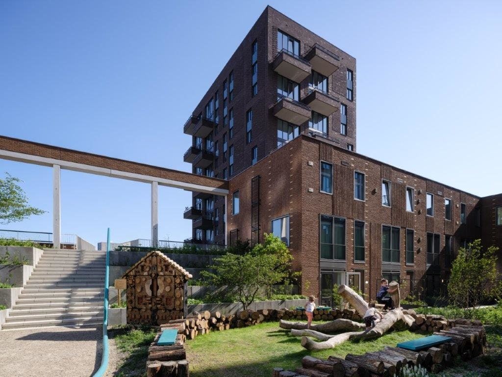 Woningbouwproject Groene Kaap in Rotterdam door bureau MASSA is een van de tien kanshebbers voor de RAP2022. Beeld Ossip van Duivenbode