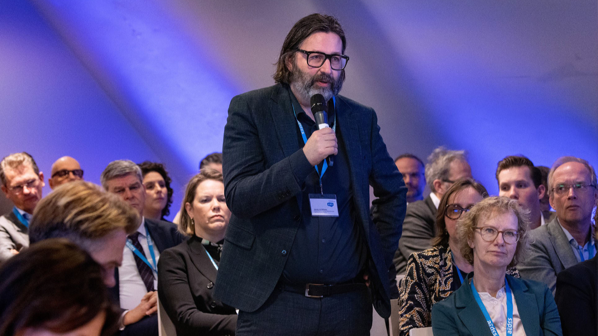 BNA Voorzitter Jeroen de Willigen tijdens de Woontop 2024 in Den Haag