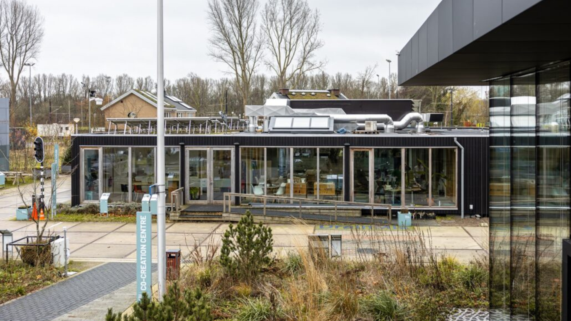 Het OfficeLab op het terrein van The Green Village/TU Delft. Beeld TU Delft