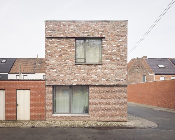 Foto's van rijwoningen en appartementen. Beeld Stijn Bollaert