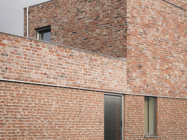 Foto's van rijwoningen en appartementen. Beeld Stijn Bollaert