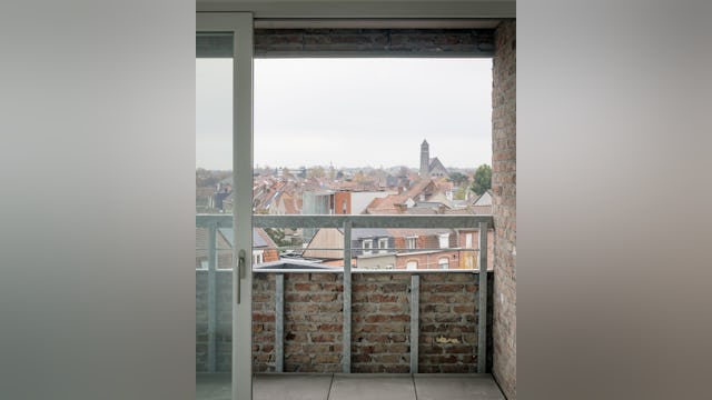 Foto's van rijwoningen en appartementen. Beeld Stijn Bollaert