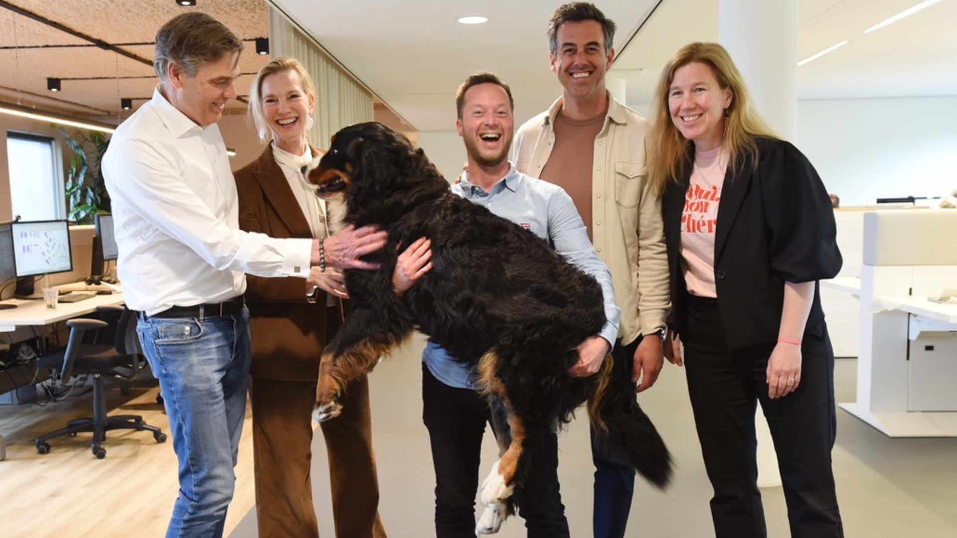 Directie Fokkema en Partners, met bureauhond Bella. Beeld Fokkema en Partners