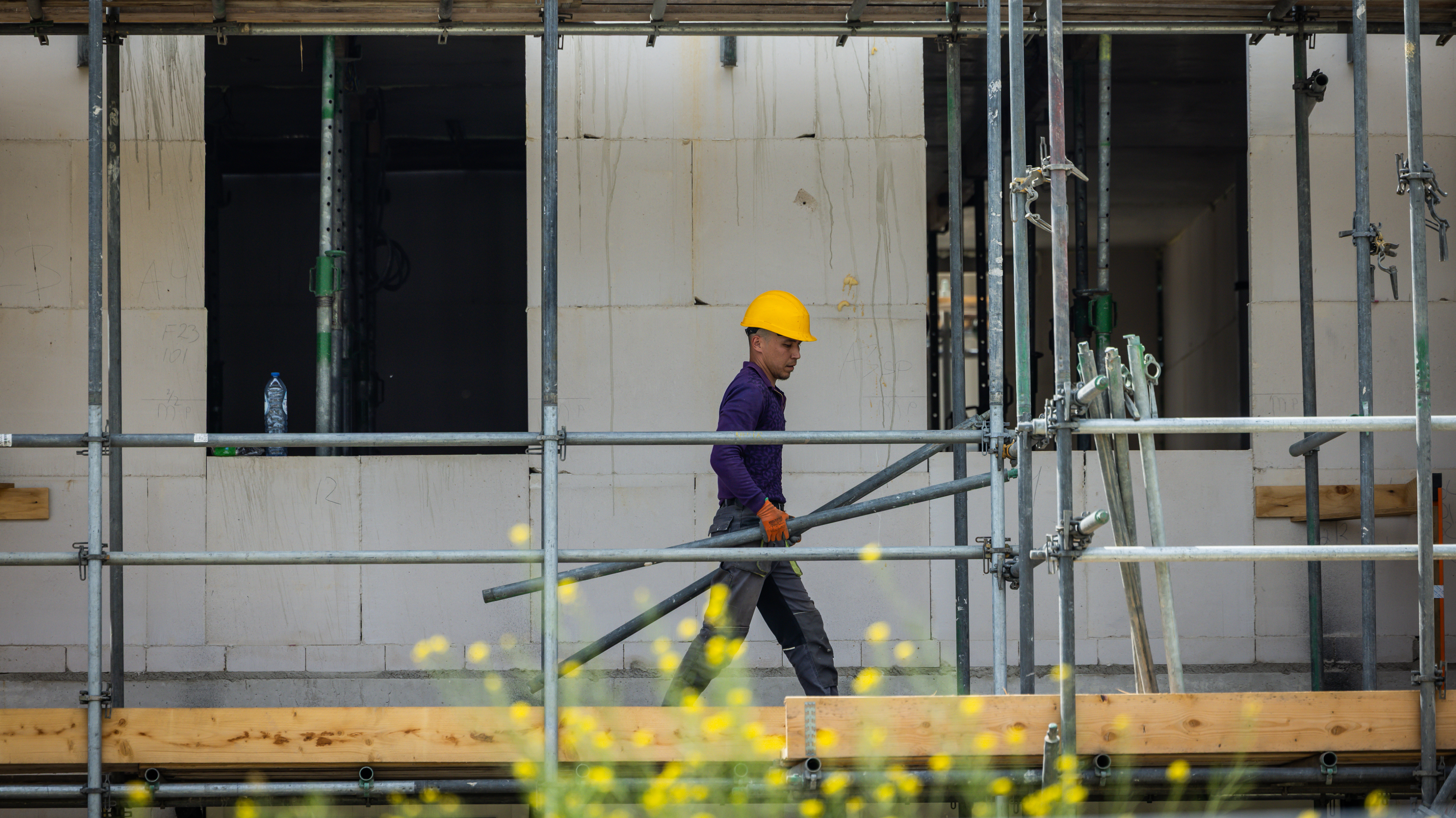 Bouwvakkers aan het werk bij een nieuwbouwproject. Beeld Laurens van Putten/ANP
